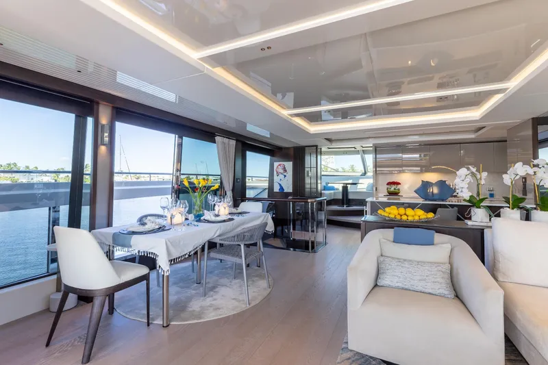 Slide: The Image of Luxurious interior of 2023 Sunseeker 90 Ocean yacht with elegant dining area and panoramic views. - 14