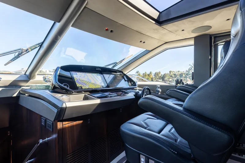 Slide: The Image of Luxurious interior of 2023 Sunseeker 90 Ocean yacht with modern navigation system. - 19