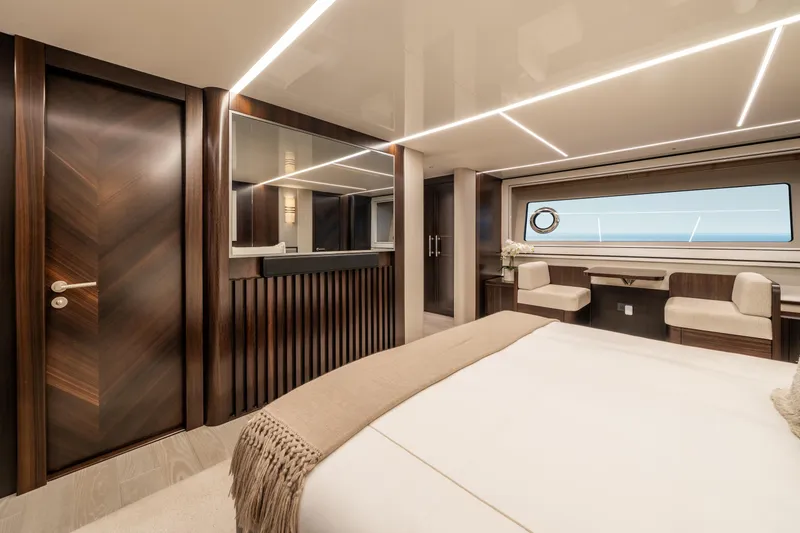 Slide: The Image of Luxurious interior of 2023 Sunseeker 90 Ocean yacht with elegant wood finishes and modern design. - 22