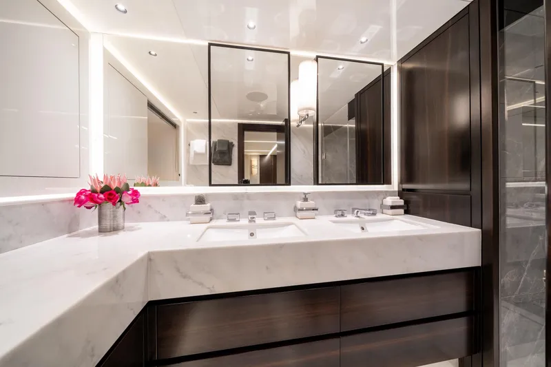 Slide: The Image of Luxurious bathroom in 2023 Sunseeker 90 Ocean yacht with marble countertops and elegant lighting. - 26