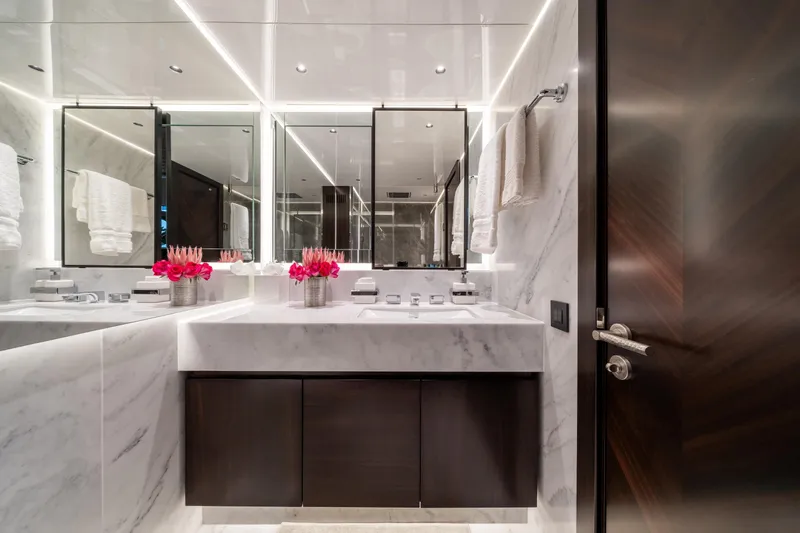 Slide: The Image of Luxurious bathroom on 2023 Sunseeker 90 Ocean yacht with marble finishes and elegant decor. - 29