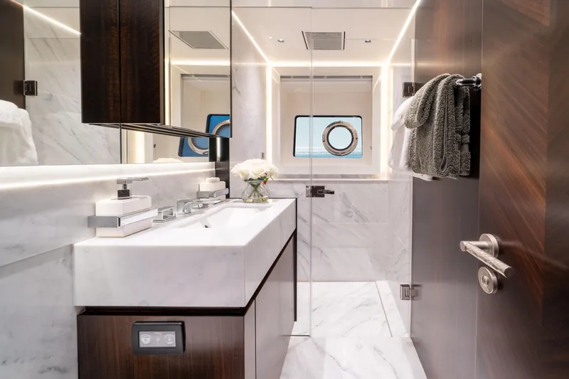 Slide: The Image of Luxurious bathroom in 2023 Sunseeker 90 Ocean yacht with marble finishes and modern fixtures. - 31