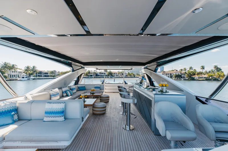 Slide: The Image of Luxurious 2023 Sunseeker 90 Ocean yacht interior with elegant seating and bar area. - 35