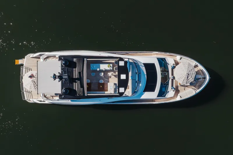 Slide: The Image of Aerial view of 2023 Sunseeker 90 Ocean luxury yacht on calm water. - 5