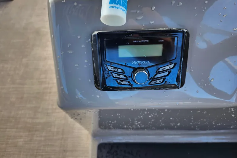 Slide: The Image of Kicker media center on 2023 Sun Tracker Party Barge 18 DLX, wet surface. - 15