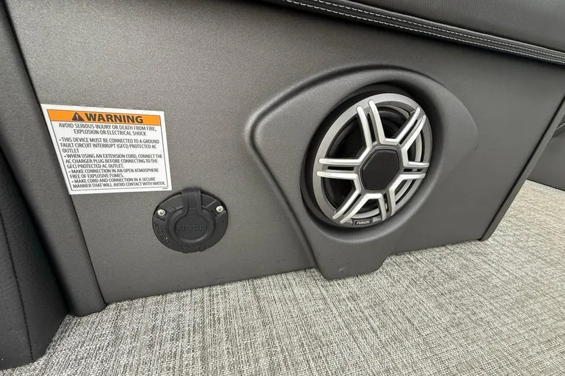 Slide: The Image of 2026 Avalon Excalibur LTD Quad Lounger Shift speaker and warning label detail. - 16