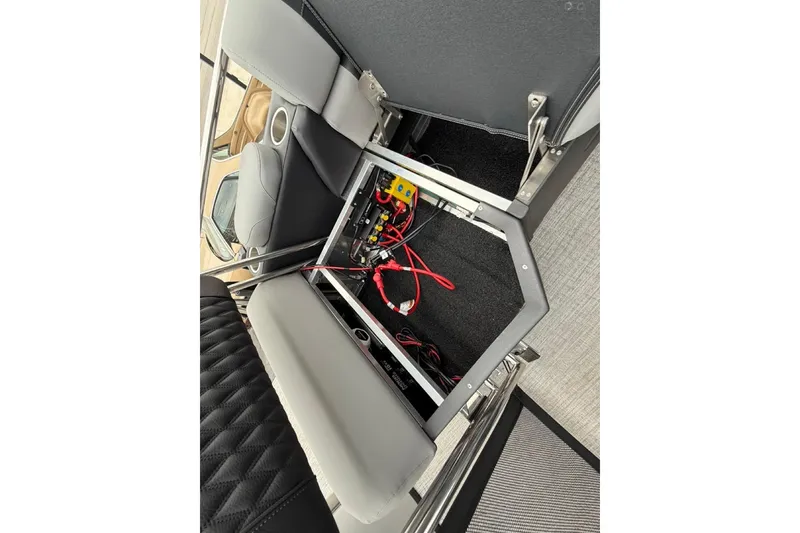 Slide: The Image of Interior view of 2026 Avalon Excalibur LTD Quad Lounger Shift, showcasing storage compartment. - 22