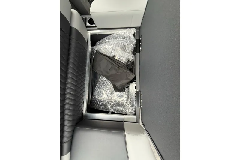 Slide: The Image of Interior storage compartment of 2026 Avalon Excalibur LTD Quad Lounger Shift. - 25