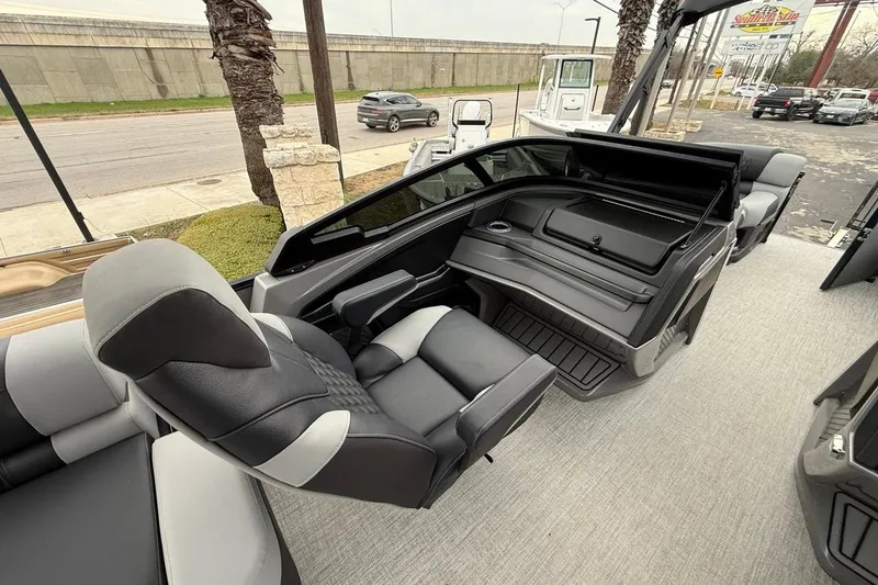 Slide: The Image of Luxurious interior of 2026 Avalon Excalibur LTD Quad Lounger Shift boat, featuring sleek seating. - 29