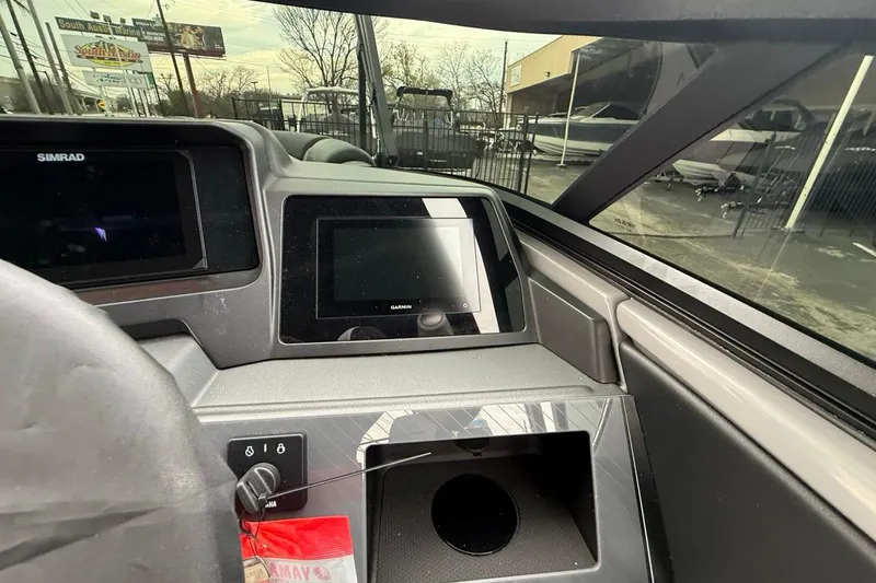 Slide: The Image of Interior dashboard of 2026 Avalon Excalibur LTD Quad Lounger Shift with Simrad and Garmin displays. - 35