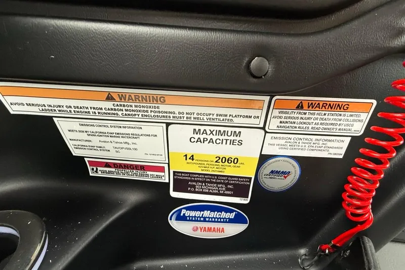 Slide: The Image of Warning labels and capacity information on 2026 Avalon Excalibur LTD Quad Lounger Shift. - 38