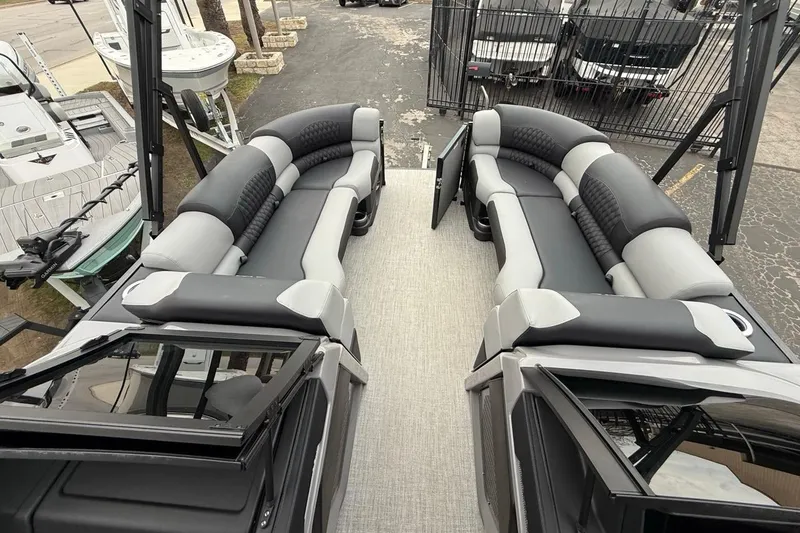 Slide: The Image of 2026 Avalon Excalibur LTD Quad Lounger Shift boat interior with luxurious seating arrangement. - 43