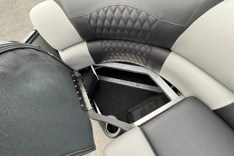 Slide: The Image of 2026 Avalon Excalibur LTD Quad Lounger Shift interior seating with storage compartment. - 49