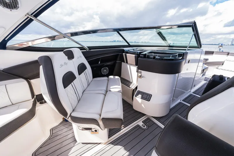 Slide: The Image of Luxurious interior of 2018 Sea Ray SLX 350 Outboard boat with plush seating and sleek design. - 24