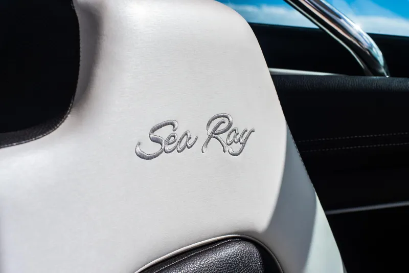 Slide: The Image of Close-up of Sea Ray logo on 2018 SLX 350 Outboard boat seat. - 26