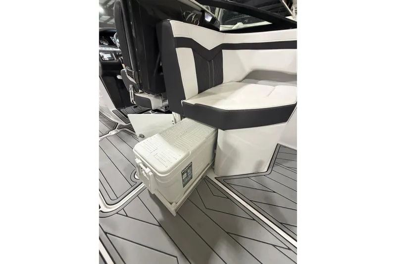 Slide: The Image of 2023 Monterey 255SS Super Sport boat interior with integrated cooler storage. - 12