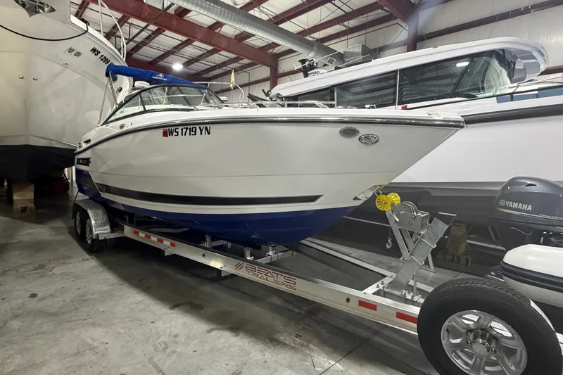 Slide: The Image of 2023 Monterey 255SS Super Sport boat on trailer in indoor storage facility. - 3
