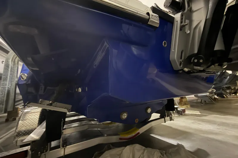 Slide: The Image of 2023 Monterey 255SS Super Sport boat hull in a storage facility. - 4