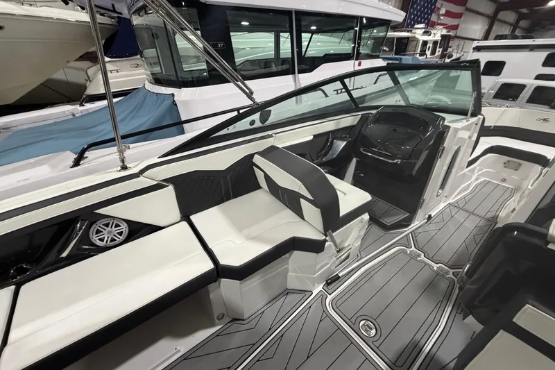 Slide: The Image of 2023 Monterey 255SS Super Sport boat interior with sleek seating and modern dashboard. - 9