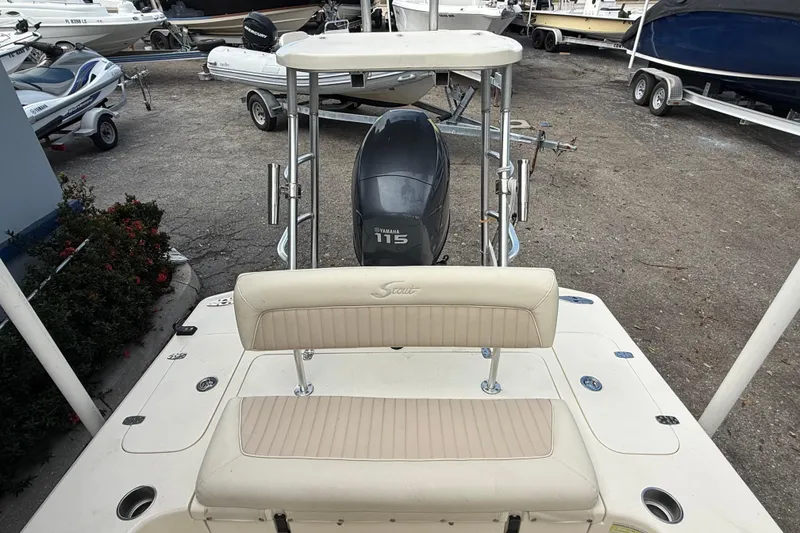 Slide: The Image of 2006 Scout 170 Costa boat with Yamaha 115 engine, parked on a trailer. - 10