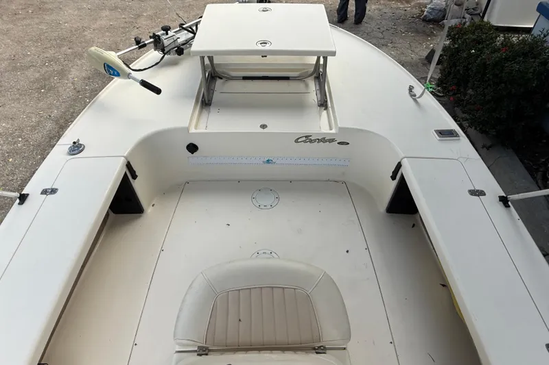 Slide: The Image of 2006 Scout 170 Costa boat interior with seating and storage compartments. - 22