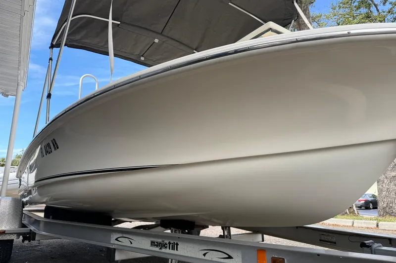 Slide: The Image of 2006 Scout 170 Costa boat on trailer with canopy, side view. - 4