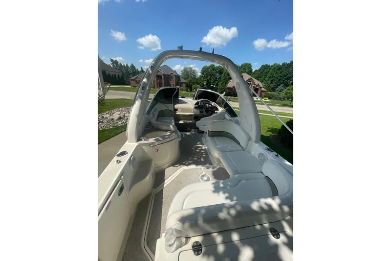 Slide: The Image of Engine compartment of a 2006 Sea Ray 260 Sundancer boat, showing mechanical components and filters. - 20