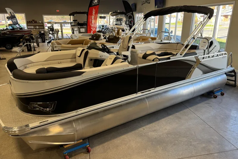 The Image of 2026 Avalon LSZ 23 Elite pontoon boat displayed in showroom. - 1