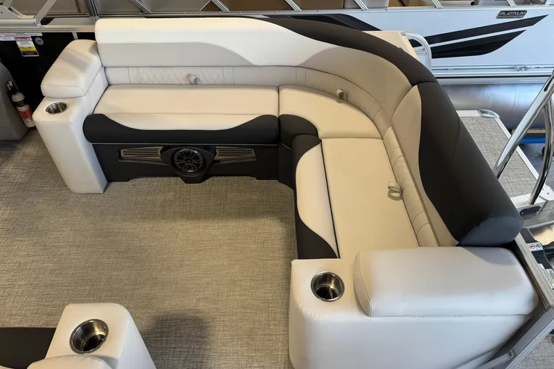 Slide: The Image of Luxurious seating on 2026 Avalon LSZ 23 Elite pontoon boat, featuring cup holders and stylish design. - 14