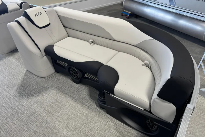 Slide: The Image of 2026 Avalon LSZ 23 Elite boat seating, featuring luxurious black and white upholstery. - 7