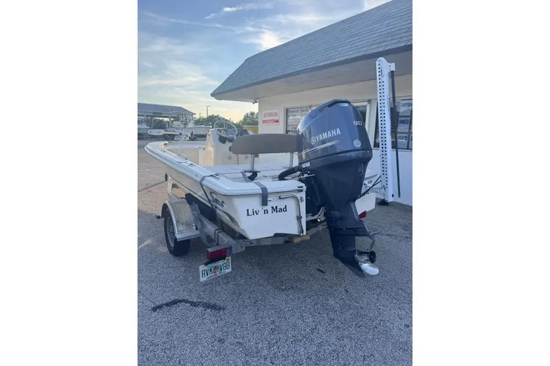 Slide: The Image of 2016 Scout 177 Sport boat with Yamaha motor, parked on a trailer. - 5