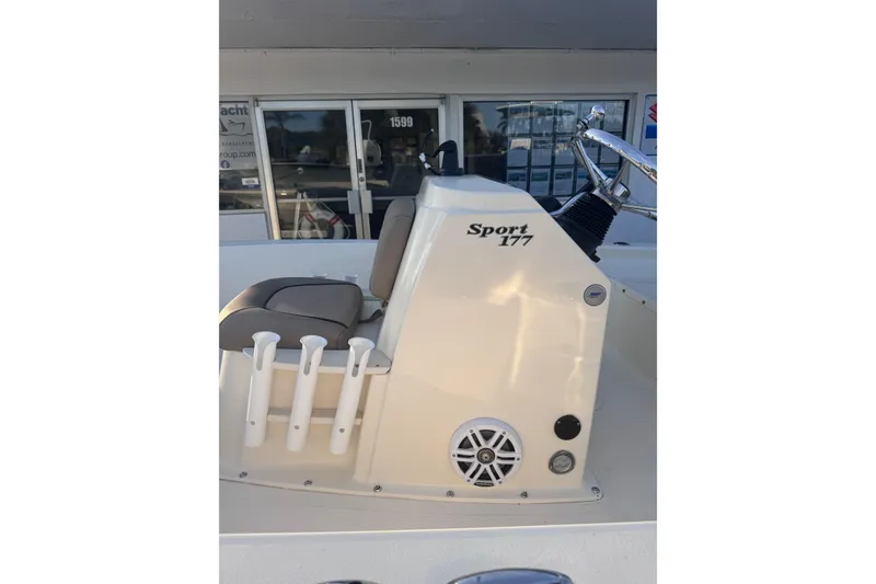 Slide: The Image of 2016 Scout 177 Sport boat interior with seating and console details. - 7