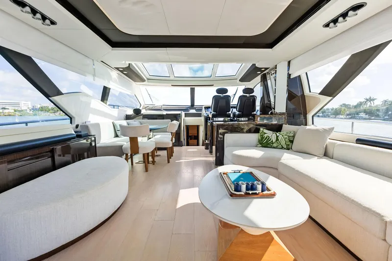 Slide: The Image of Luxurious interior of 2017 Azimut 77S yacht with modern seating and panoramic windows. - 11