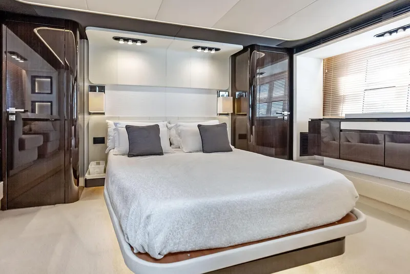 Slide: The Image of Luxurious bedroom interior of 2017 Azimut 77S yacht with modern design and elegant furnishings. - 23