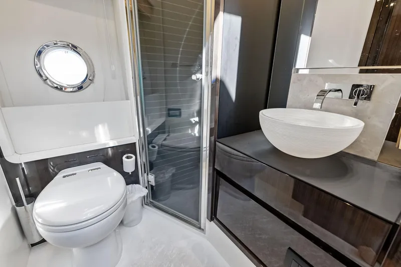Slide: The Image of Luxury bathroom in 2017 Azimut 77S yacht with modern fixtures and sleek design. - 33