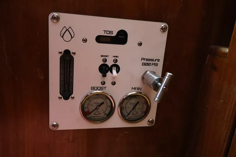 Slide: The Image of Control panel on 1988 Sea Ranger 46 Sundeck Trawler, displaying pressure gauges and settings. - 18