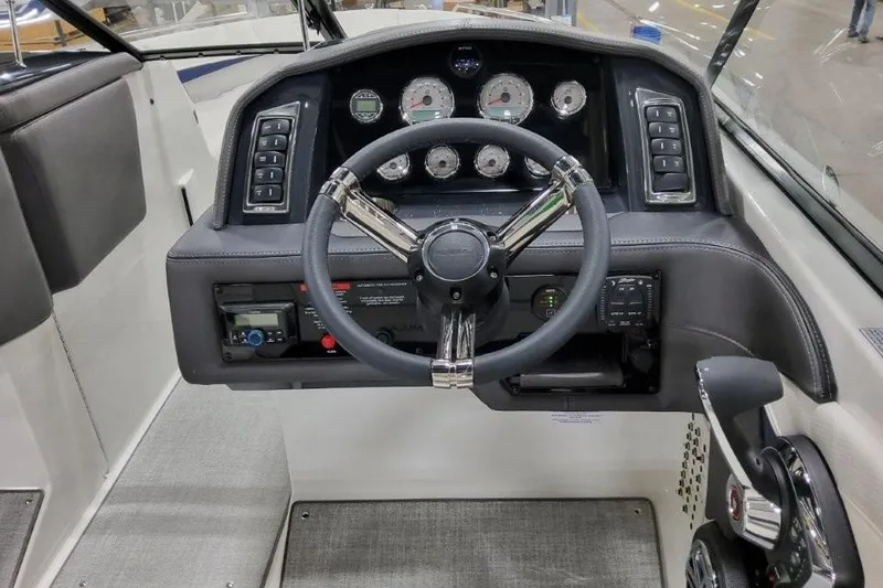 Slide: The Image of 2026 Formula 270 Bowrider dashboard with steering wheel and control panel. - 16