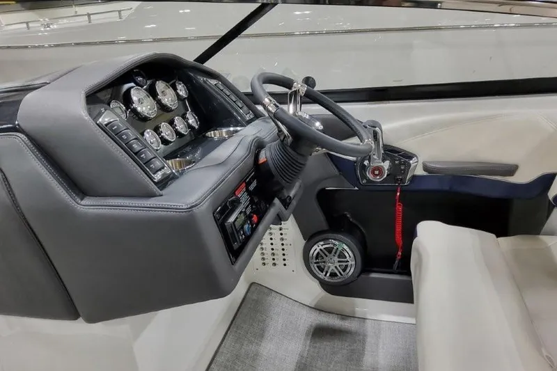 Slide: The Image of 2026 Formula 270 Bowrider dashboard with steering wheel and control panel. - 39