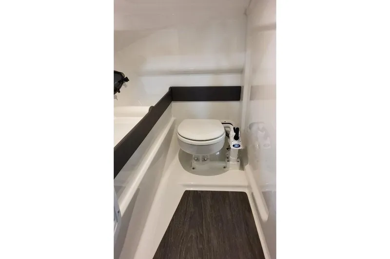 Slide: The Image of 2026 Formula 270 Bowrider boat interior with modern marine toilet. - 42