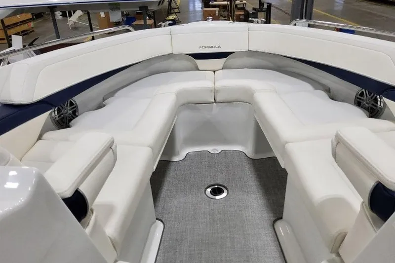 Slide: The Image of Luxurious seating in 2026 Formula 270 Bowrider boat, featuring elegant white upholstery. - 43
