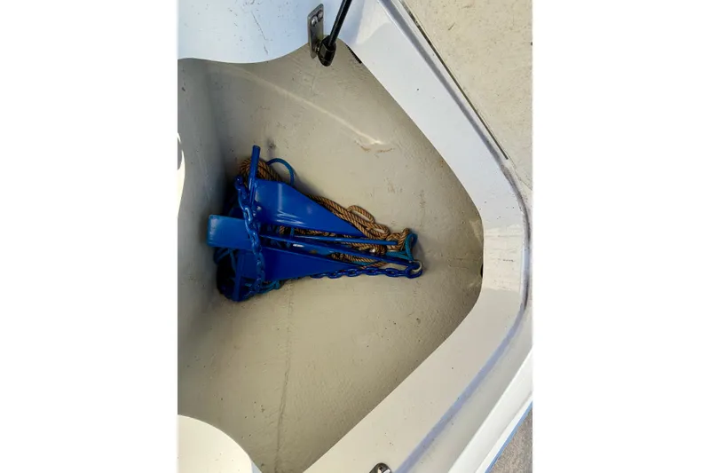 Slide: The Image of 2008 Cobalt 282 boat interior with beige leather seating and sleek design. - 10