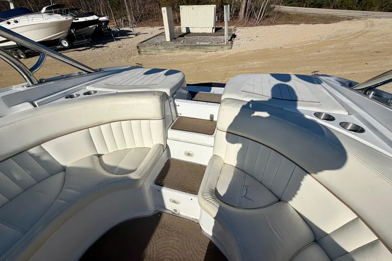 Slide: The Image of 2008 Cobalt 282 boat interior with plush seating and sleek design. - 20