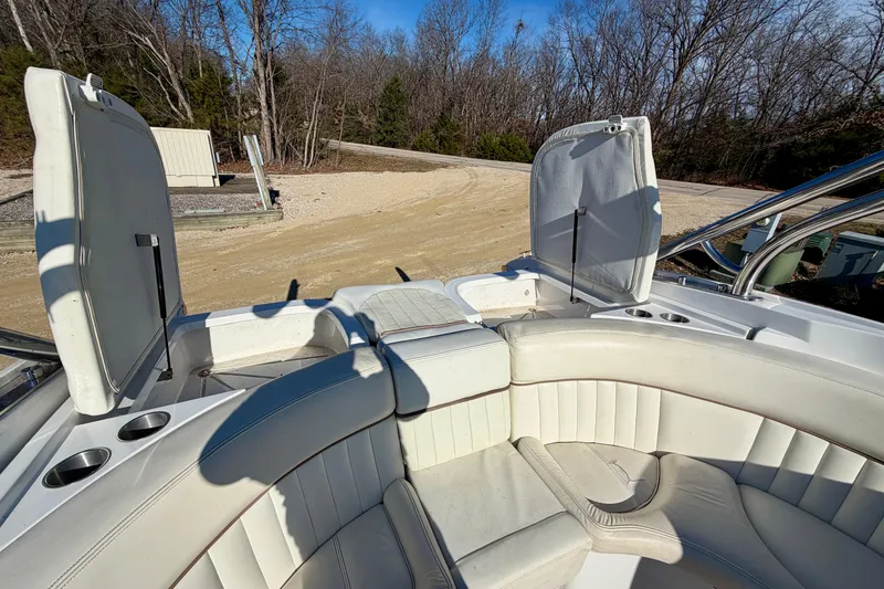 Slide: The Image of Interior of 2008 Cobalt 282 boat with cup holders and seating. - 24