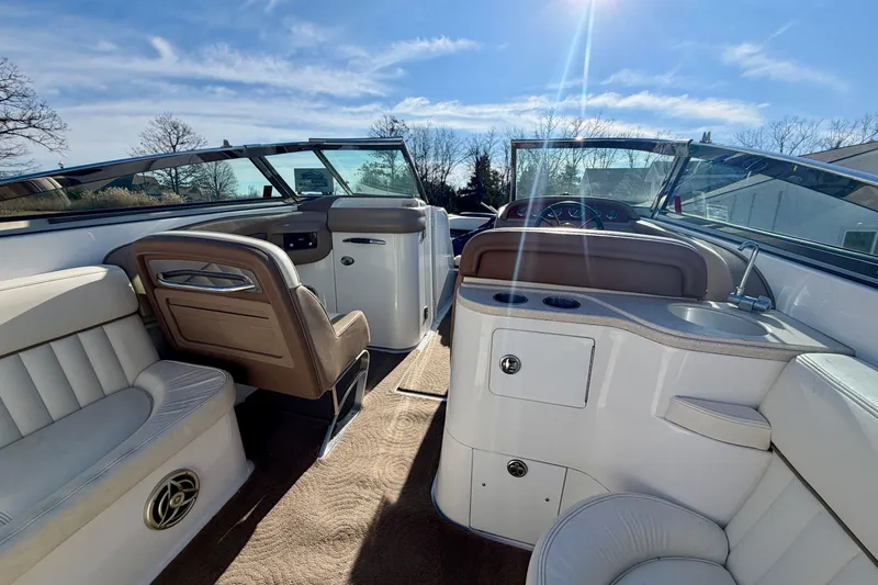 Slide: The Image of 2008 Cobalt 282 boat interior with storage compartment and speaker. - 25