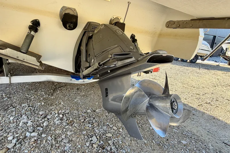 Slide: The Image of 2008 Cobalt 282 boat on trailer, rear view with cover, parked outdoors. - 4