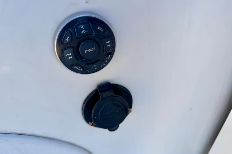 Slide: The Image of 2008 Cobalt 282 boat rear view with propeller, parked on gravel. - 5