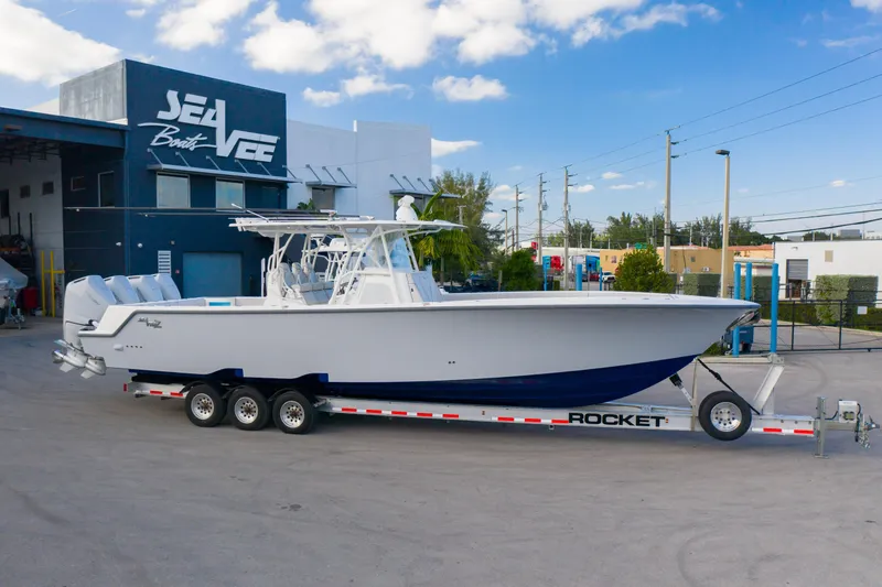 The Image of 2025 SeaVee 400Z boat on trailer outside SeaVee Boats facility. - 0