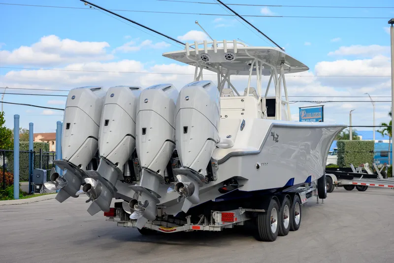 Slide: The Image of 2025 SeaVee 400Z boat interior with open storage compartments and seating. - 12