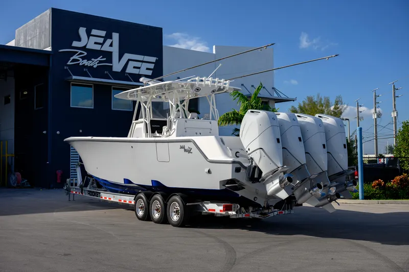 Slide: The Image of 2025 SeaVee 400Z boat interior bathroom with toilet and storage compartments. - 15