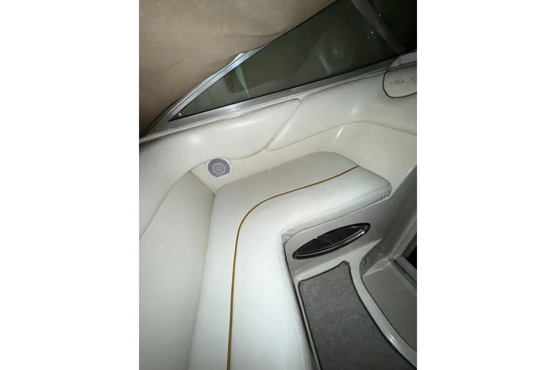 Slide: The Image of Interior of 2000 Sea Ray 240 Sundancer with control panel and sink. - 21